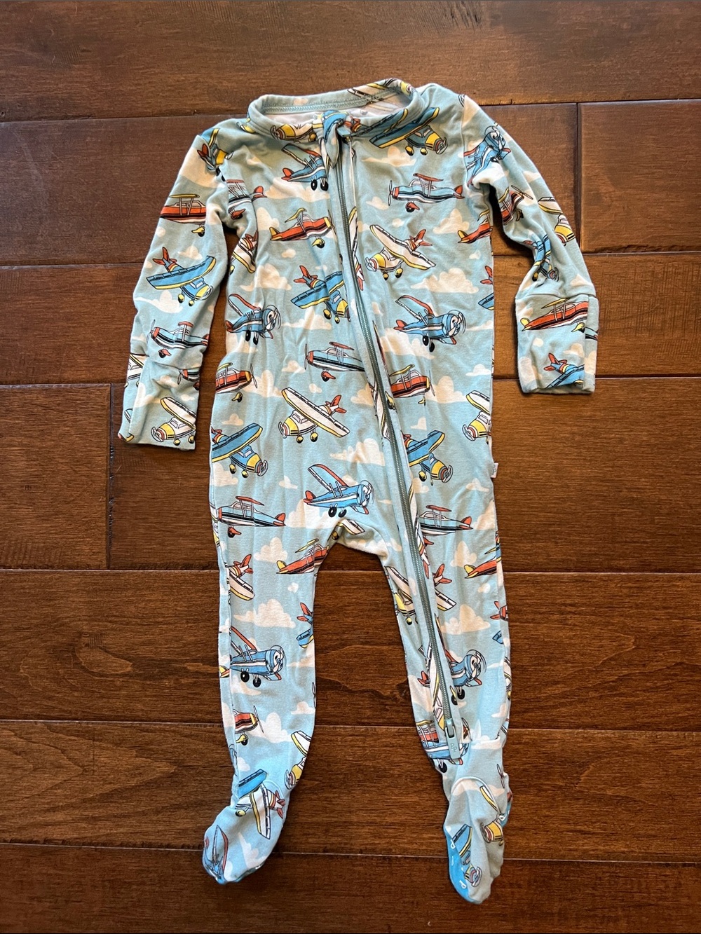 Posh Peanut Airplane Print Footed Pajamas - Light Blue with Red & Yellow Accents
